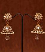 Avni's white stones jhumkas studded with uncut stones and pearls