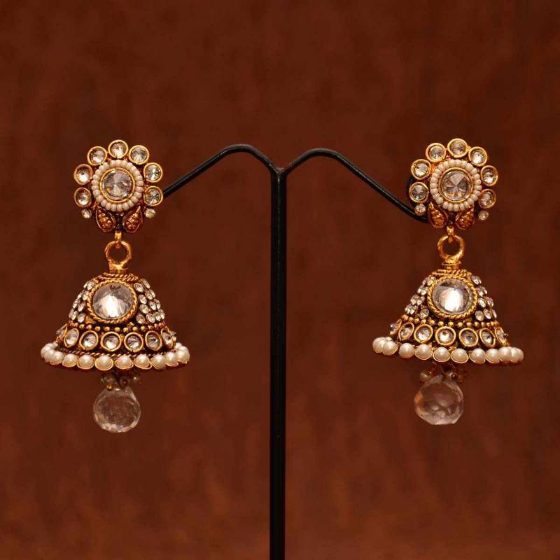 Avni's white stones jhumkas studded with uncut stones and pearls