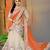 Cream and orange net embroidered unstitched lehenga choli