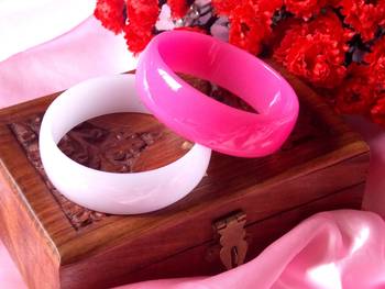 pink and white plastic bangles 1