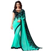 Sea green embroidered georgette saree with blouse
