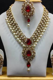 Dazzling Kundan Set in White and Red with Pearls
