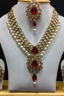 Dazzling Kundan Set in White and Red with Pearls
