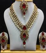 Dazzling Kundan Set in White and Red with Pearls