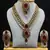 Dazzling Kundan Set in White and Red with Pearls