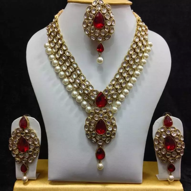 Dazzling Kundan Set in White and Red with Pearls