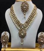 Dazzling Kundan Set in White with Pearls