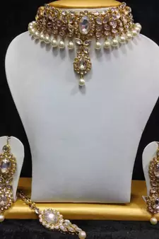 Close Neck Style Kundan Jewelry in White and Pearls