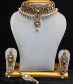 Close Neck Style Kundan Jewelry in White and Pearls