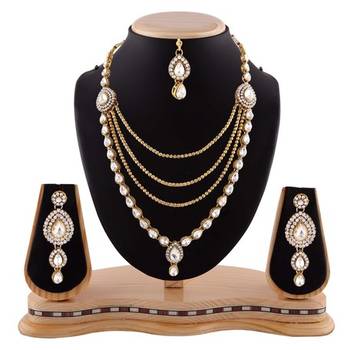 Auatrian Stone Four Layer Gold Finishing Party Wear Necklace Set With Maang Tikka 1