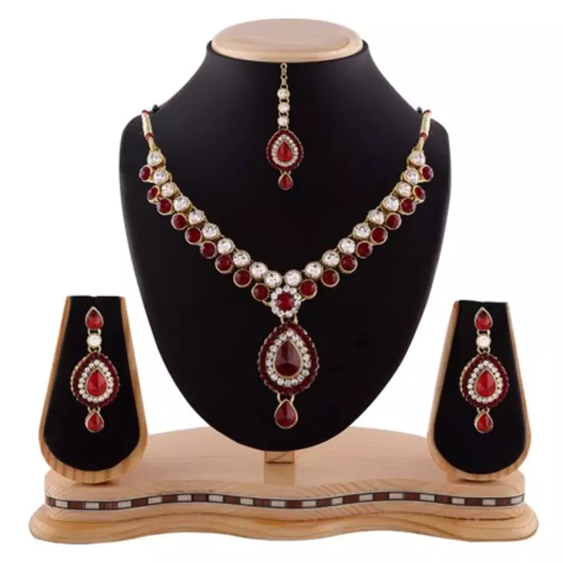 Maroon Austrian Stone Party Wear Gold Finishing Necklace Set With Maang Tikka