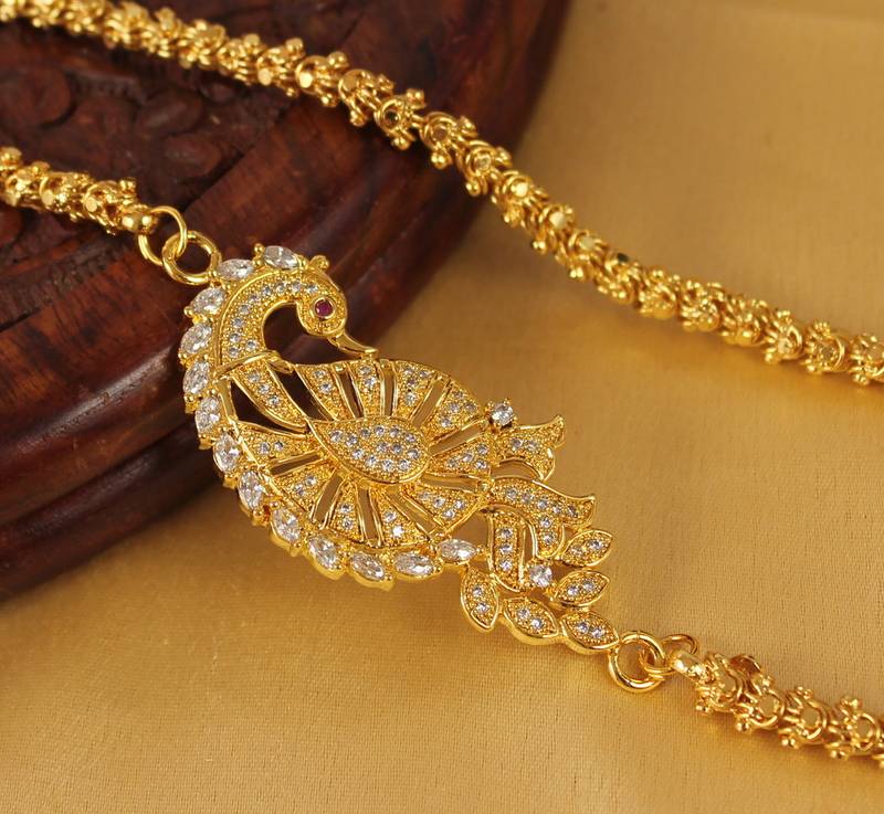 Gorgeous gold plated designer peacock 