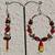 Red and Silver hoops.