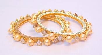 Fine Ad Pearl Bangles 1