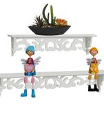 Simple And Elegant Designed White Wall Shelves