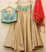 Red and golden and sky blue brocade mirror work unstitched lehenga choli
