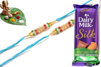 Multicolour different stone beads and metallic casting rakhi with chocolates 1