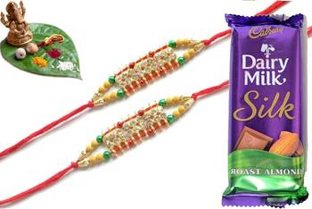 Multicolour different stone beads and metallic casting rakhi with chocolates 1