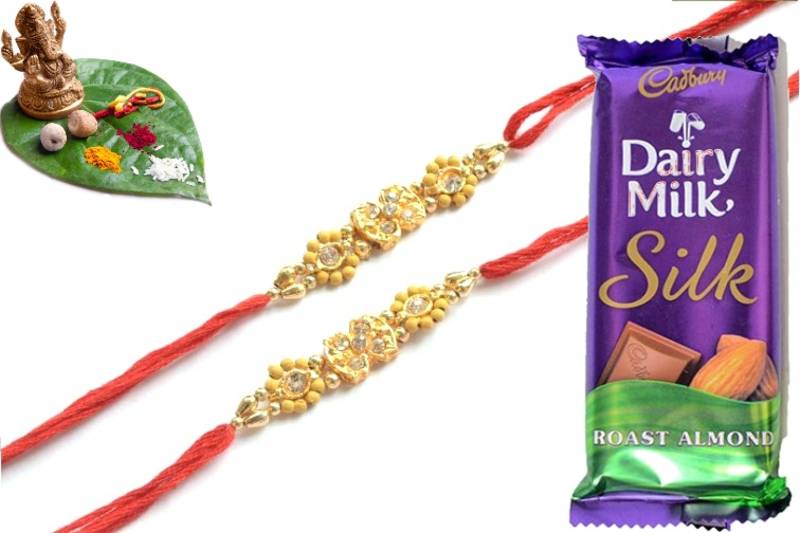 Multicolour different stone beads and metallic casting rakhi with chocolates