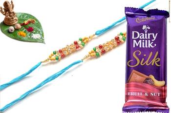 Multicolour different stone beads and metallic casting rakhi with chocolates 1
