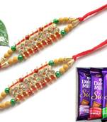 Multicolour different stone beads and metallic casting rakhi with chocolates