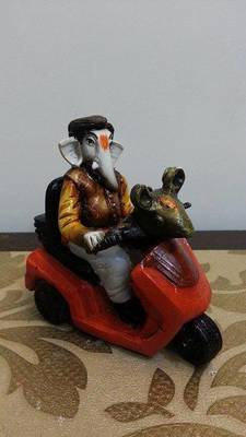 Ganesha Riding Bike 1
