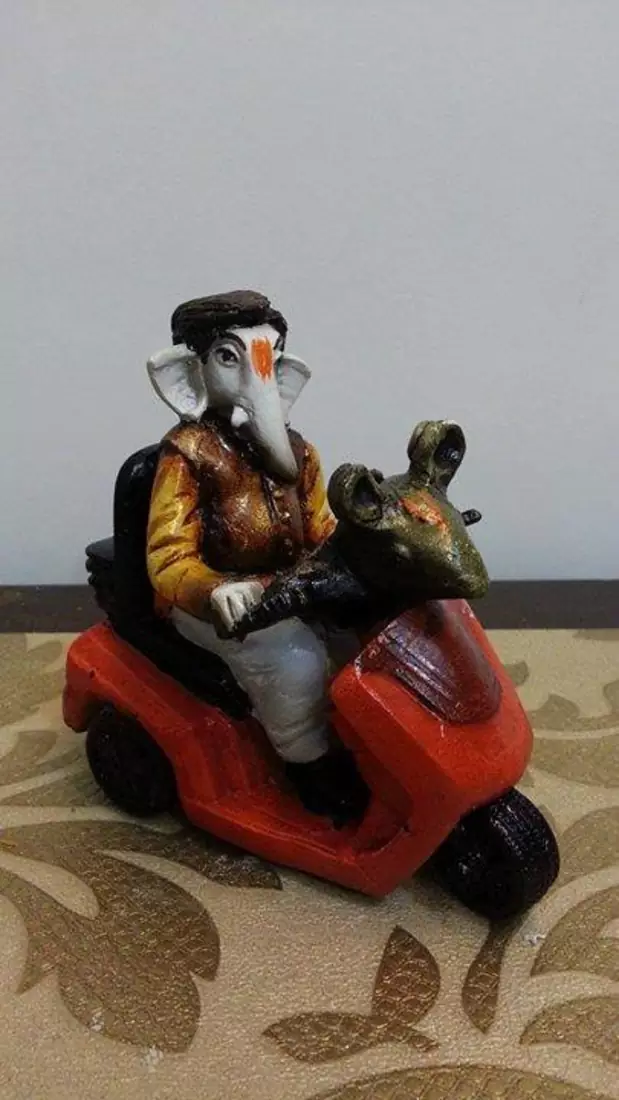 Ganesha Riding Bike