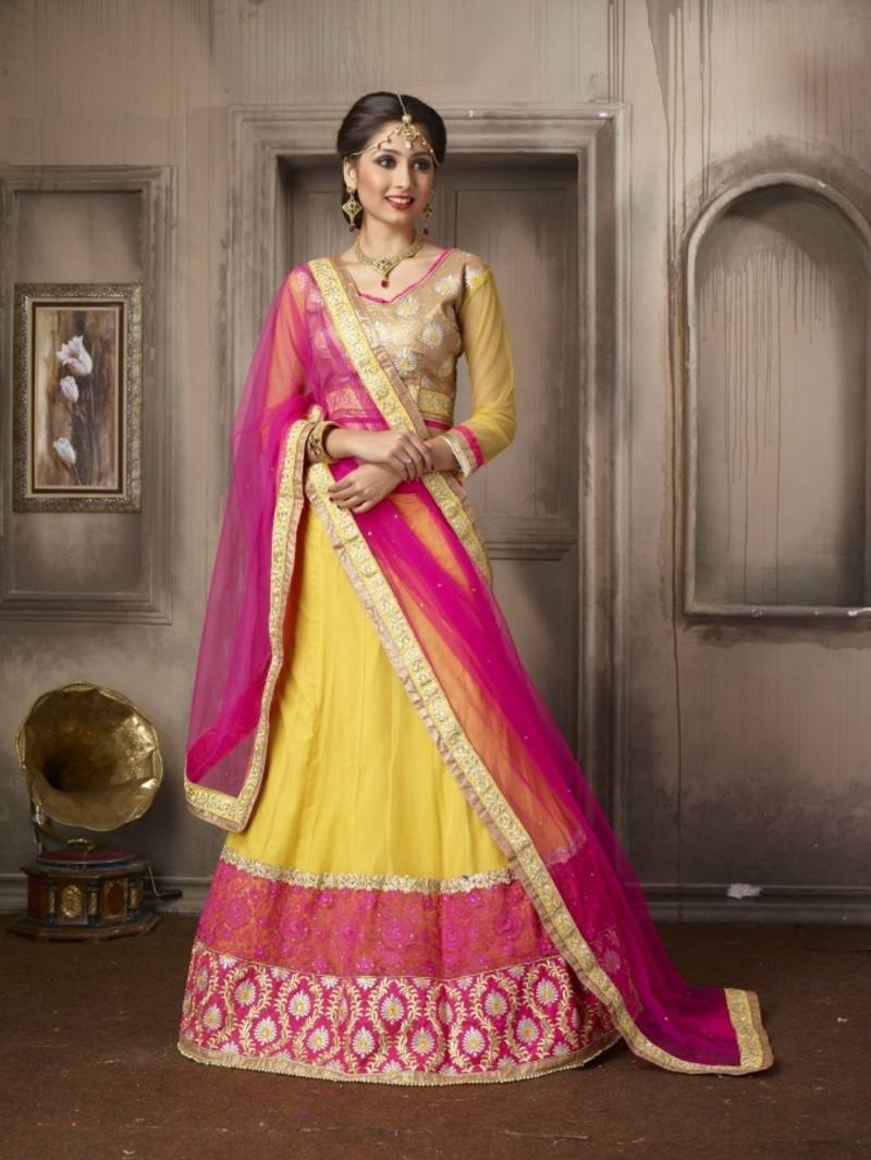 Yellow embroidered NET unstitched bridallehengas A AND V FASHION