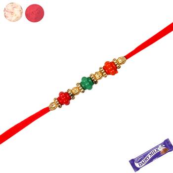Colorful crystals rakhi with red thread 1
