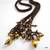 Gold and brown Lariat
