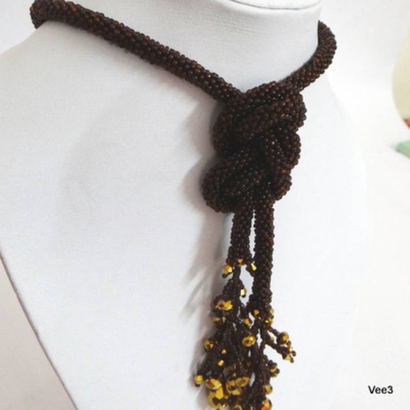 Gold and brown Lariat