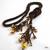 Gold and brown Lariat