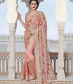 baby pink embroidered net saree With Blouse