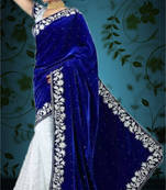Blue and white embroidered velvet saree with blouse