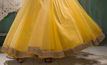 Yellow net embroidered semi stitched salwar with dupatta 3