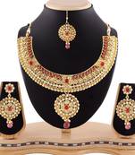 Excellent Austrian Stone Gold Finigshing Necklace Set With Maang Tikka