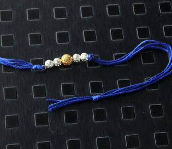 Blue Silver And Gold Rakhi 1