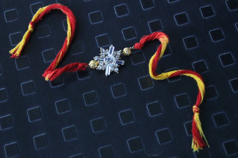 Red Mauli Swarovski Flower Rakhi