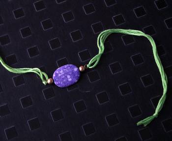 Green And Purple Stonework Rakhi 1