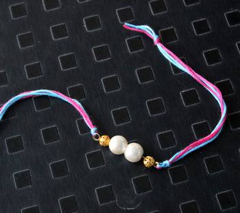 Pink And Blue Pearl Rakhi 1