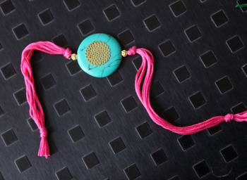 Pink And Turquoise Stonework Rakhi 1