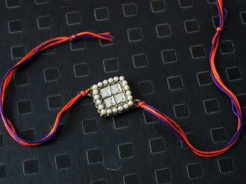 Orange And Purple Pearl Work Kundan Rakhi 1