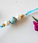Turquoise Meenakari Kundan Work And Pearl Rakhi