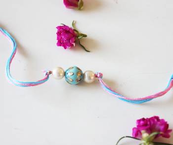 Turquoise And Pink Meenakari Kundanwork Rakhi 1