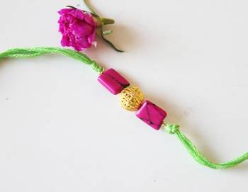 Pink And Green Stone Work Rakhi 1