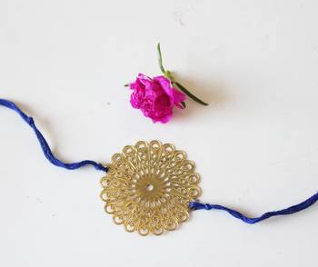 Blue And Gold Filigree Flower Rakhi 1