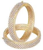 Cubic zirconia gold bangles and bracelets