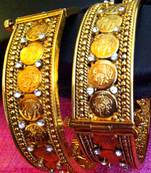 A pair of Golden Finish Lakshmi Ginni South Indian Temple Flexible Bangle Kada