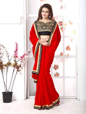 Red  embroidered chiffon saree with blouse 5