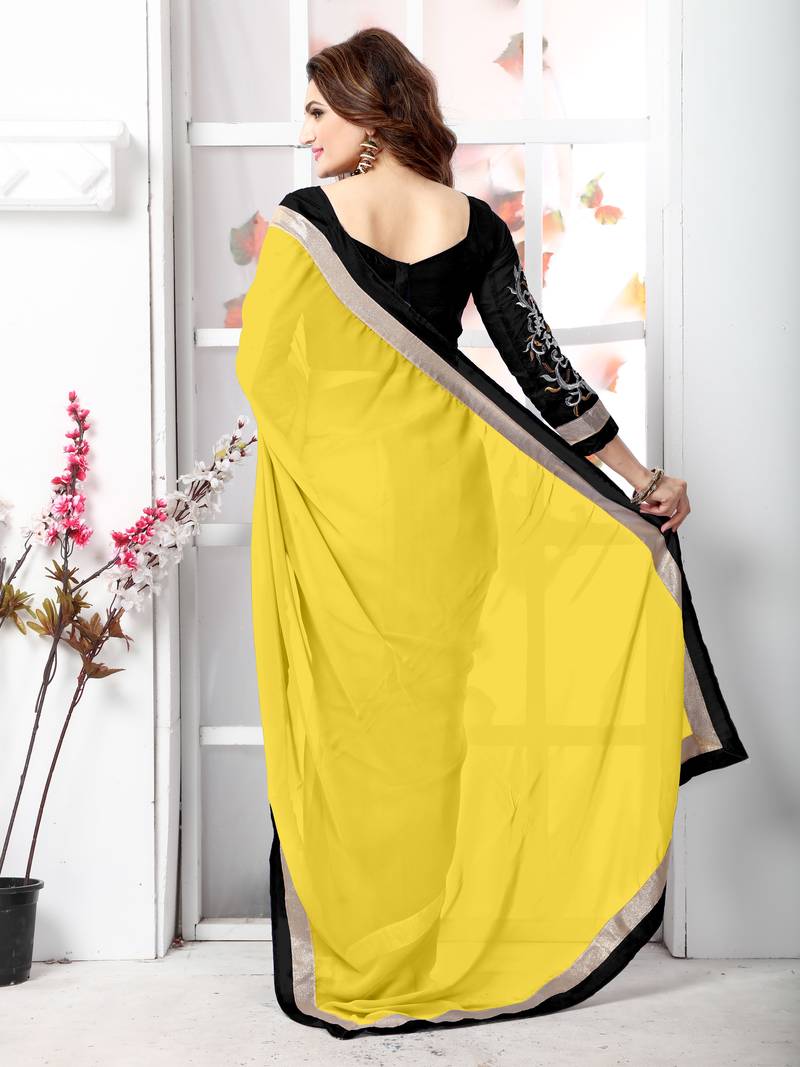 Yellow plain chiffon saree with blouse
